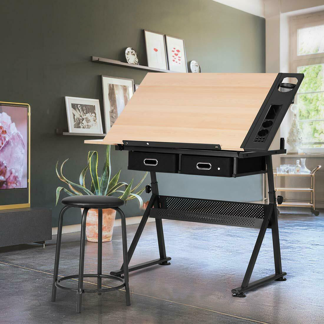 Tiltable drafting table with a free chair