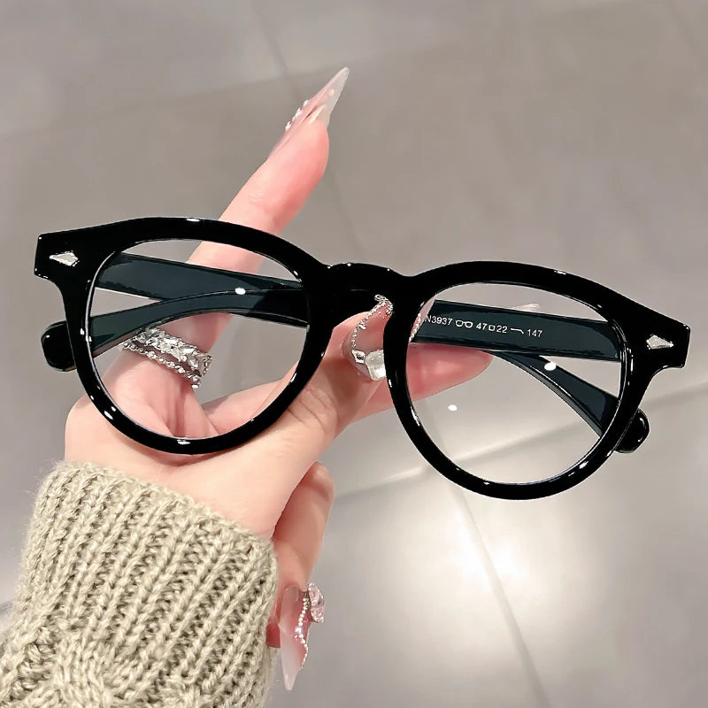 A high-end, retro Korean-style round frame anti-blue light flat glasses with a simple round frame and rice studs without makeup