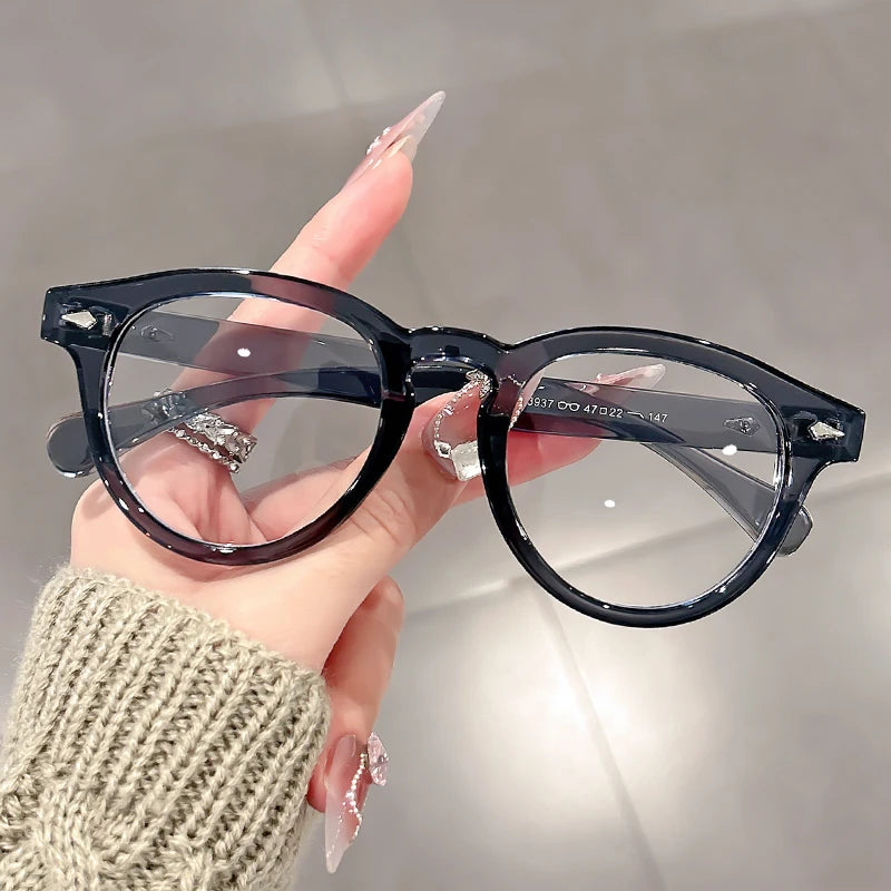 A high-end, retro Korean-style round frame anti-blue light flat glasses with a simple round frame and rice studs without makeup