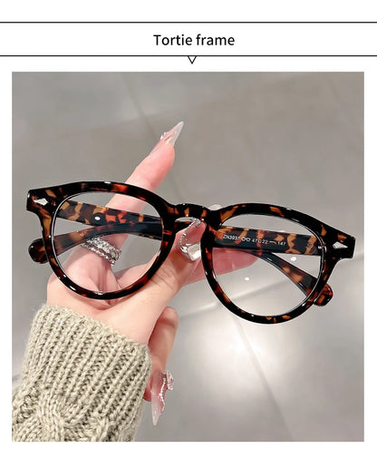 A high-end, retro Korean-style round frame anti-blue light flat glasses with a simple round frame and rice studs without makeup