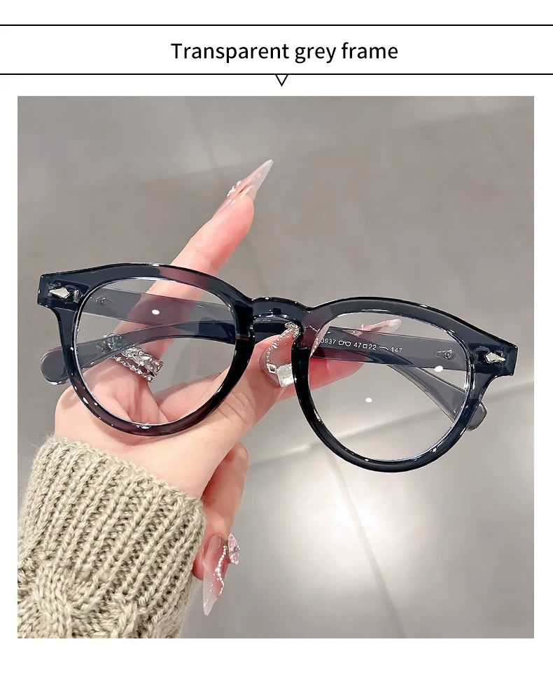 A high-end, retro Korean-style round frame anti-blue light flat glasses with a simple round frame and rice studs without makeup