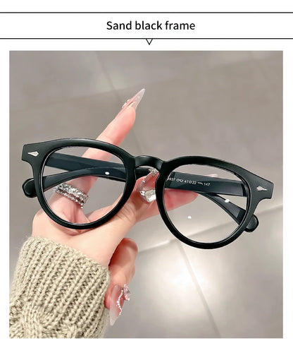A high-end, retro Korean-style round frame anti-blue light flat glasses with a simple round frame and rice studs without makeup