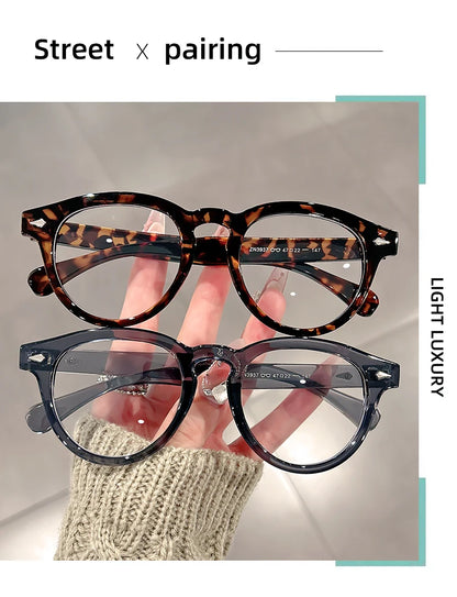 A high-end, retro Korean-style round frame anti-blue light flat glasses with a simple round frame and rice studs without makeup