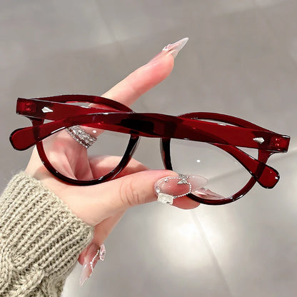 A high-end, retro Korean-style round frame anti-blue light flat glasses with a simple round frame and rice studs without makeup